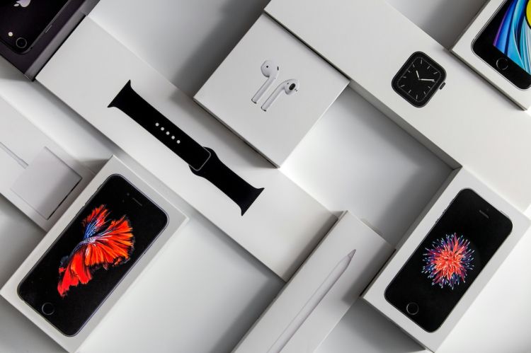 Apple product boxes set against a white background