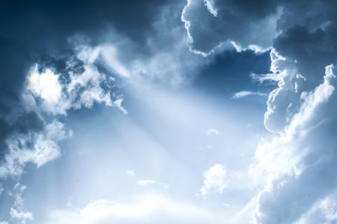 sun shining through the clouds